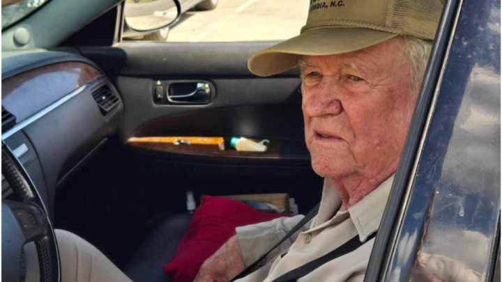 Vickie Woolard's grandpa sitting in a car